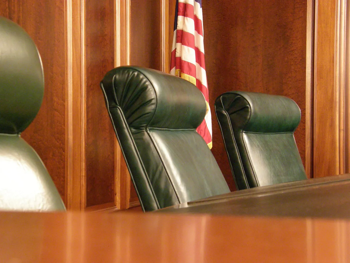 Fourth Circuit Court of Appeals courtroom showing three chairs. 